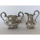 A good Victorian silver engraved cream jug and sugar bowl