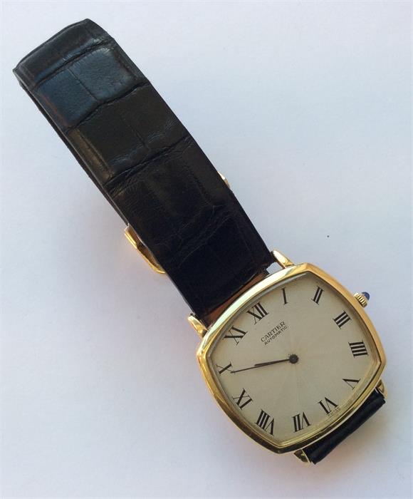A slim 18 carat Cartier wristwatch with silvered d - Image 2 of 2