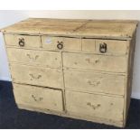 A pine nine drawer painted chest. Est. £60 - £80.