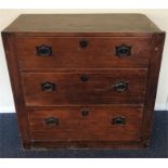 A rustic three drawer chest with tapering sides. E