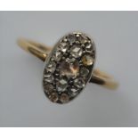 An Antique oval rose diamond cluster ring in two c