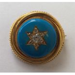 A good circular enamel decorated brooch with large