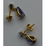 A good pair of tanzanite and diamond drop earrings