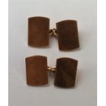 A pair of 9 carat plain cufflinks. Approx. 7.2 gra