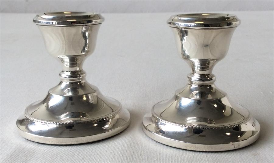 A small pair of piano candlesticks on circular bas - Image 2 of 2