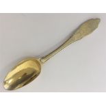 A good quality Continental silver gilt spoon attra