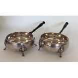 An unusual pair of plated brandy servers with turn