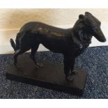 A good cast figure of a dog in standing position o