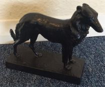 A good cast figure of a dog in standing position o