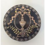 An attractive gold inlaid circular box decorated w
