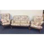 ERCOL: A good three piece settee suite of typical