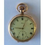 A gilt metal American pocket watch with white enam