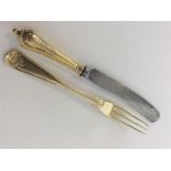 A good quality Continental silver gilt fork and kn