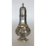A good quality silver octagonal caster with lift-o