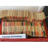 A large box containing Penguin and other paperback