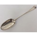 A massive George I silver basting spoon with rat t