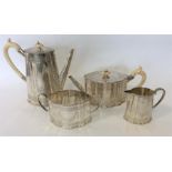 A good late Victorian four piece silver plated tea