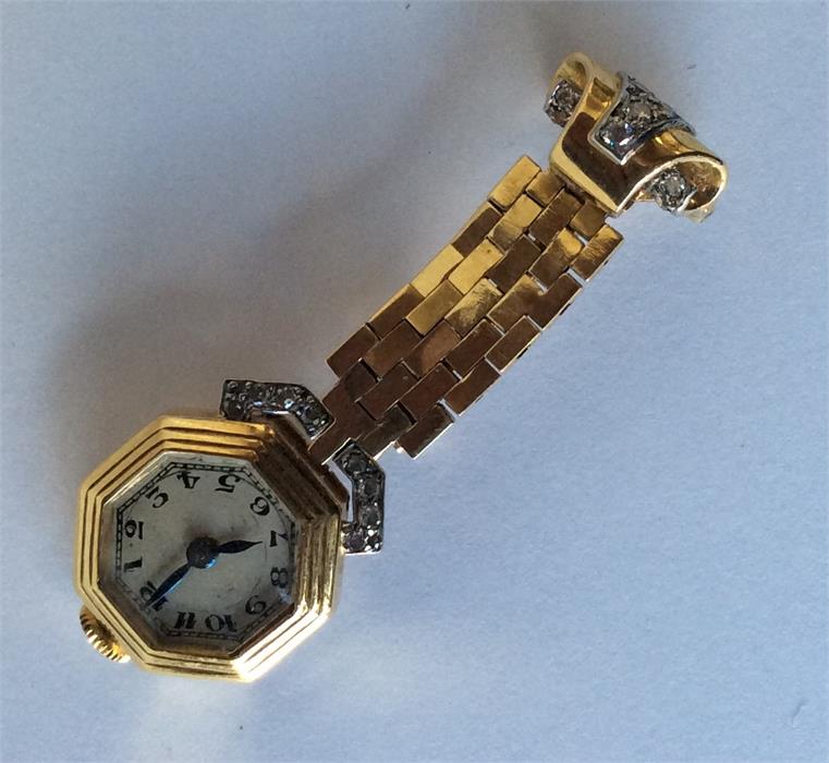 A lady's 18 carat cocktail watch inset with diamon