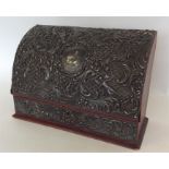 A good quality embossed silver stationery box decorated w