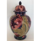 A decorative Burley vase in the style of Moorcroft