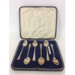 A good boxed set of six silver coffee spoons with