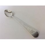 A large silver OE pattern basting spoon. London. By WI. A