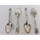 A set of four Continental silver serving spoons with tape
