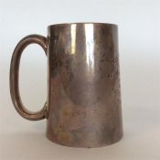 A small tapering silver cup with rounded handle. S