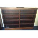 A large mahogany bookcase. Est. £40 - £60.