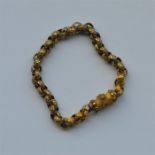 A Georgian gold bracelet with star links to barrel