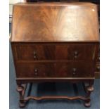 A Queen Anne style mahogany drop flap bureau with