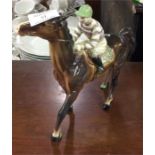 A Beswick figure of a racehorse.