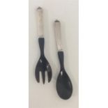 GEORG JENSEN: A pair of silver and ebony servers w