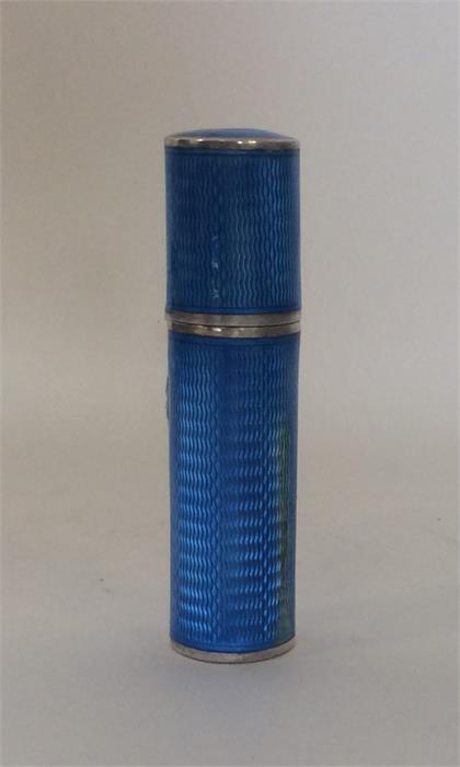 A stylish enamel and silver scent bottle with scre