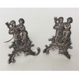 A pair of good quality silver menu holders depicti