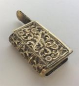 An unusual Indian silver vesta case in the form of