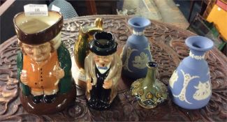 Wedgwood vases, Royal Doulton Toby jugs etc.