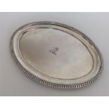 A good Georgian silver oval letter tray with gadro