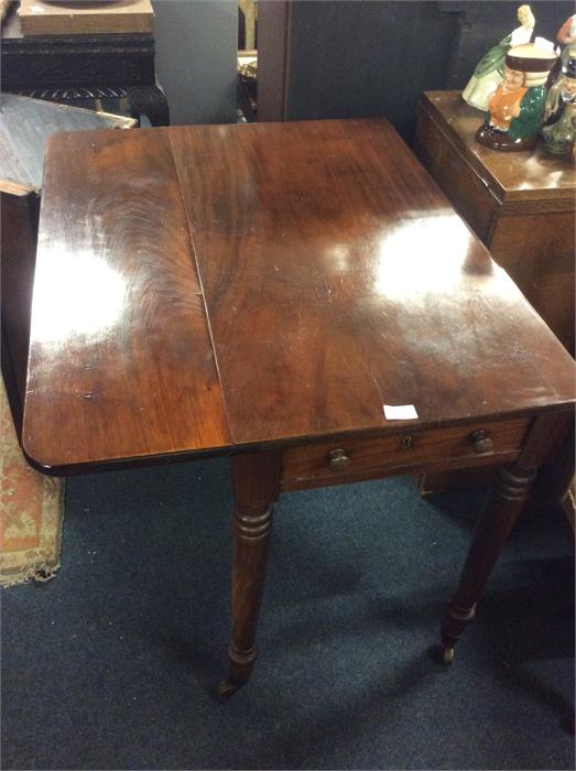 A mahogany Sutherland table.