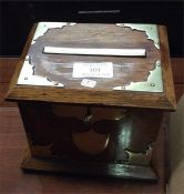An oak mounted tobacco box.