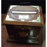 An oak mounted tobacco box.