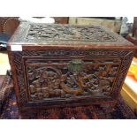 A small camphor wood carved trunk.