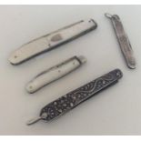 A group of four silver mounted fruit knives with e