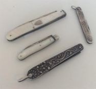 A group of four silver mounted fruit knives with e