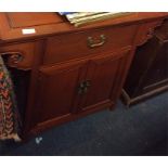 An Oriental single drawer hall table.