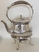 A heavy in date Victorian silver kettle on stand w