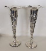 A heavy pair of Chinese silver spill vases attract