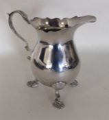 A heavy miniature Georgian style silver cream jug