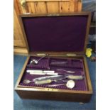 An old oak cased cutlery box and contents.