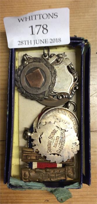 Silver watch medallions etc.
